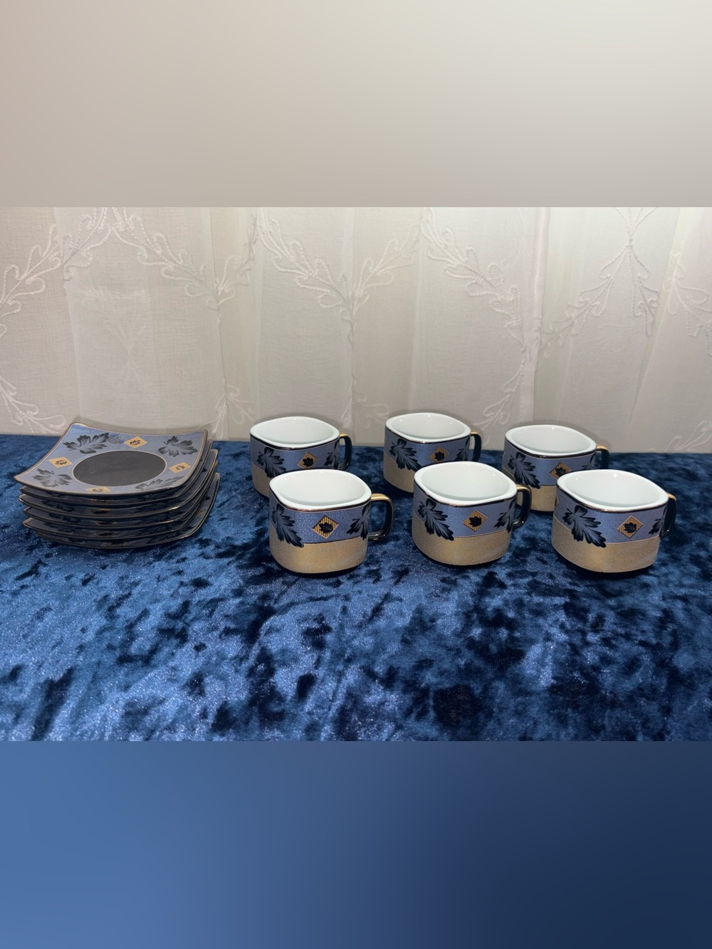 Blue and Gold Leaf Porcelain Teacup and Saucer Set